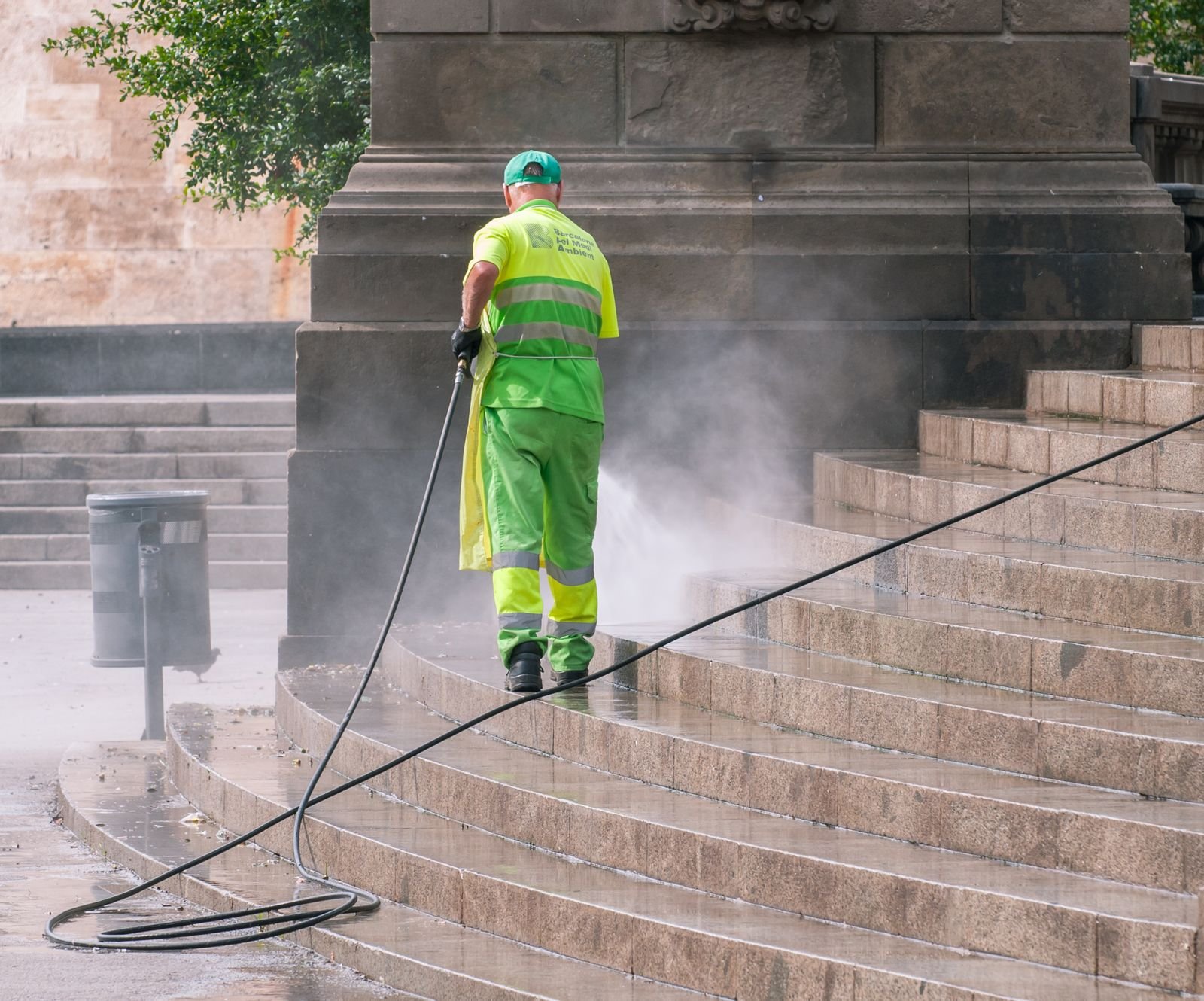 Clean pavers in Florida: pressure washing a paver driveway to lift dirt and algae